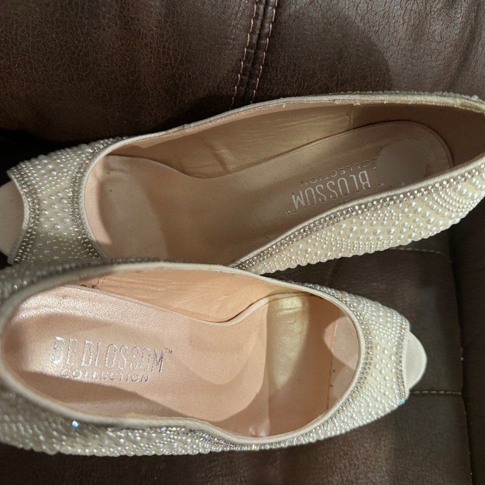 Beautiful off white crystal and glitter shoes. Only worn to try on and practice